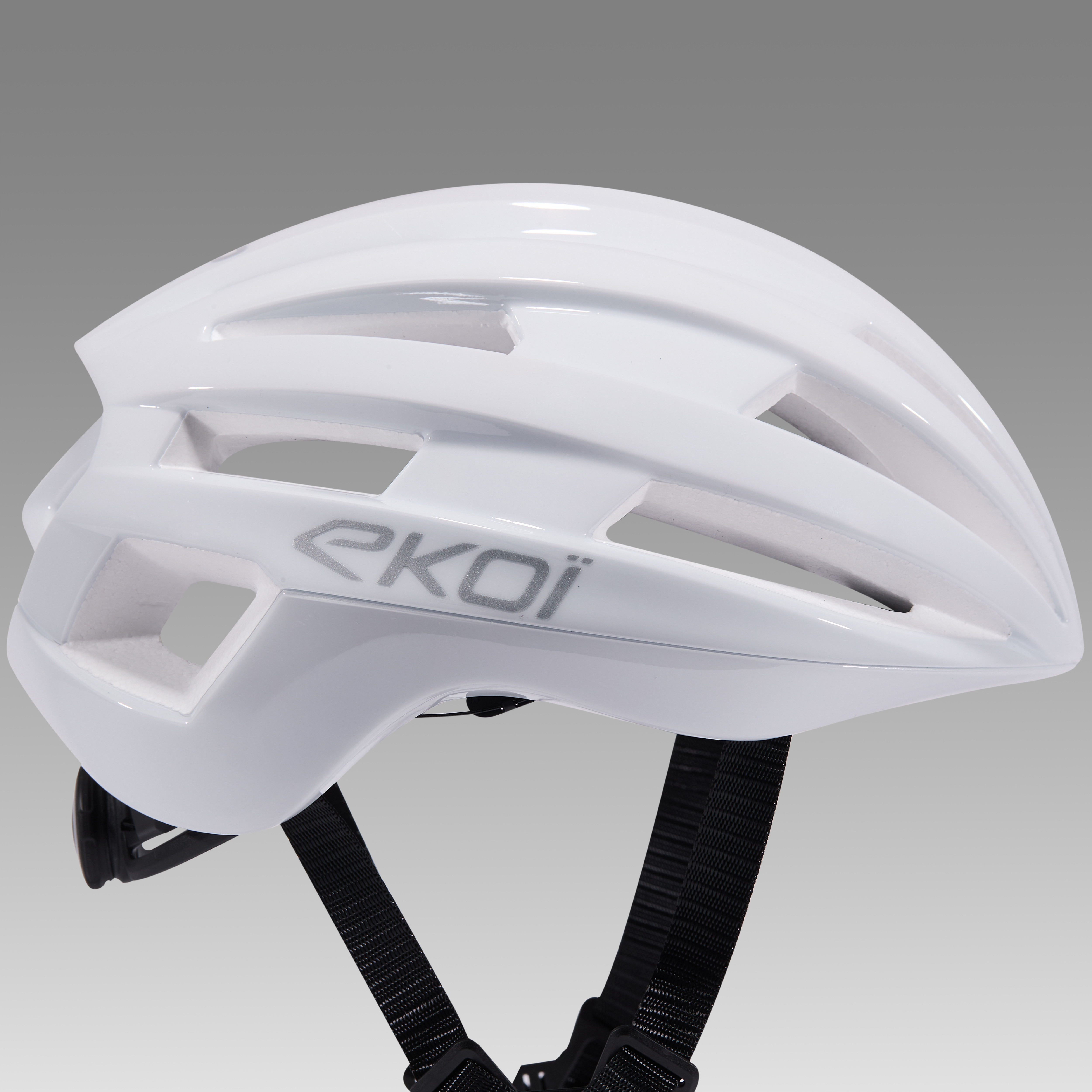 casco-ekoi-perf-gara-blanco-logo-silver.jpg